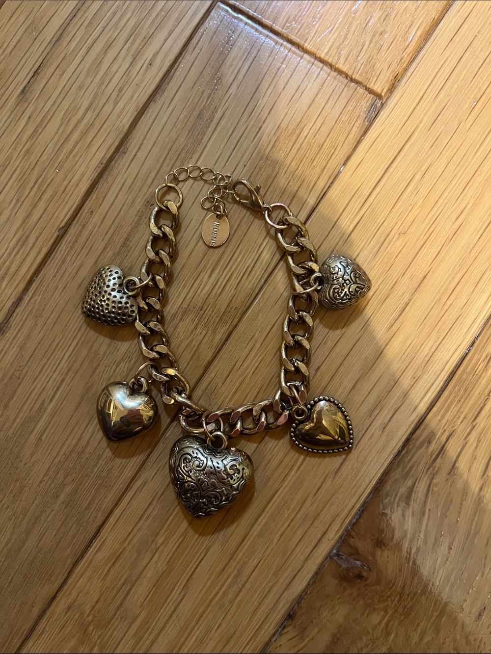 Chunky gold tone heart charm bracelet